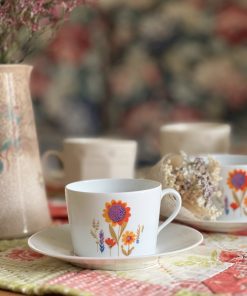 Tasse à café vintage fleurs oranges